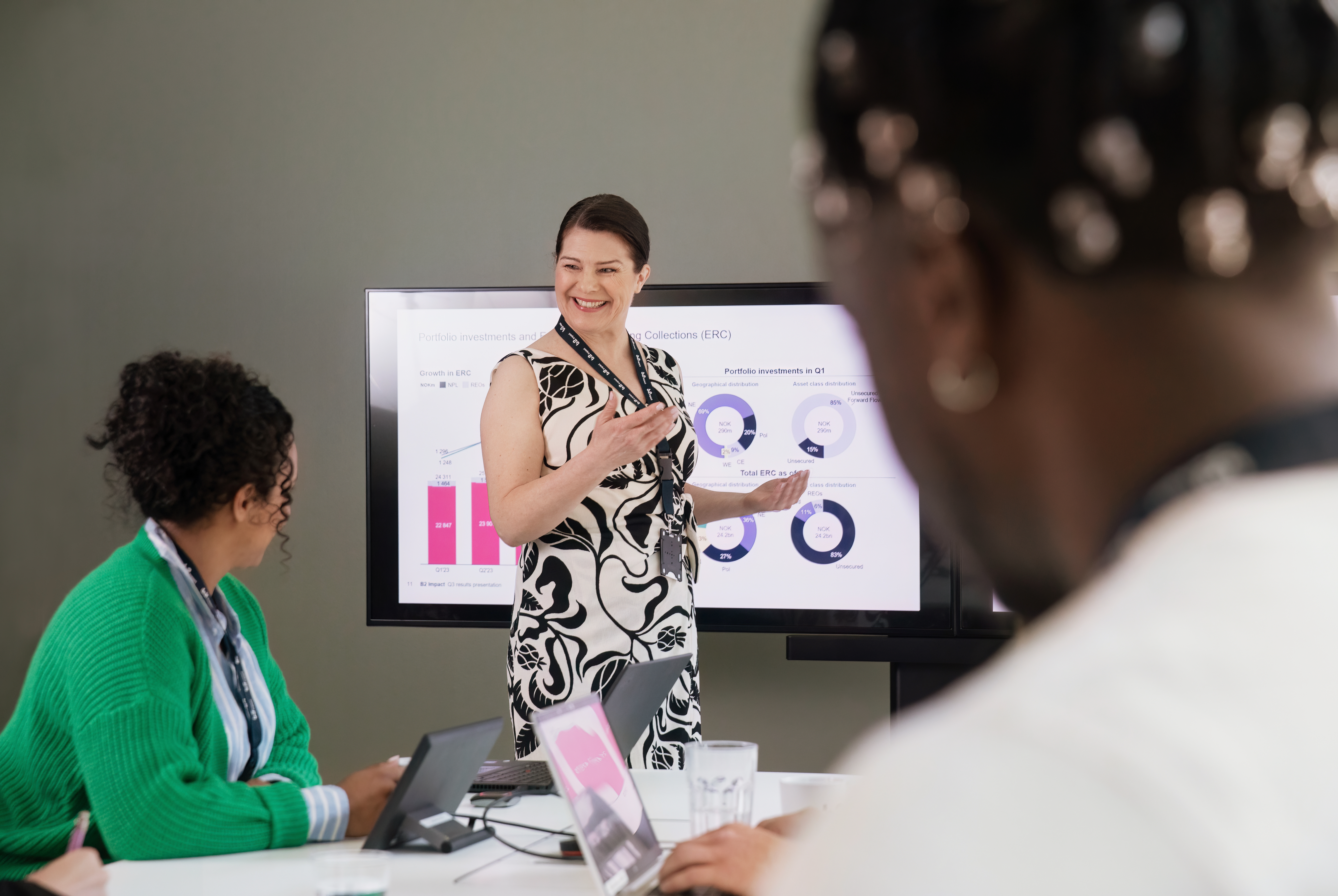 Woman presenting in a meeting room