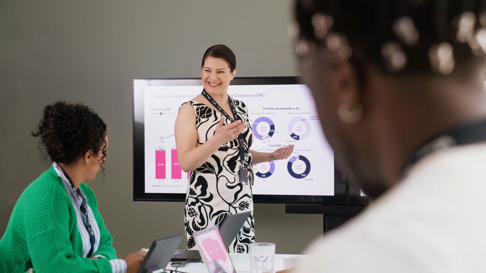 Woman presenting in a meeting room